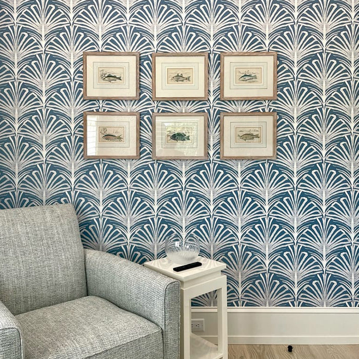 Living room corner with Suzy Steel wallpaper in blue and white botanical design, made-to-order, fast, USA-made quality.