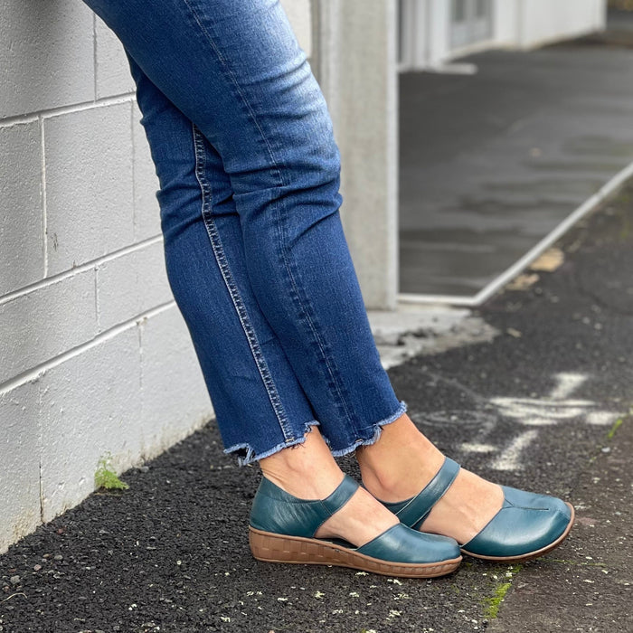 Smart denim blue sandal in soft leather uppers. Velcro strap, wedge sole unit. Comfortable women's sandal. Women's shoes with cushioned footbed.