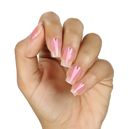 Team Sweets baby pink nail polish manicure on a medium skin tone