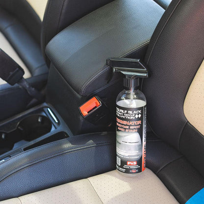 A bottle of P & S Terminator on a leather car seat.