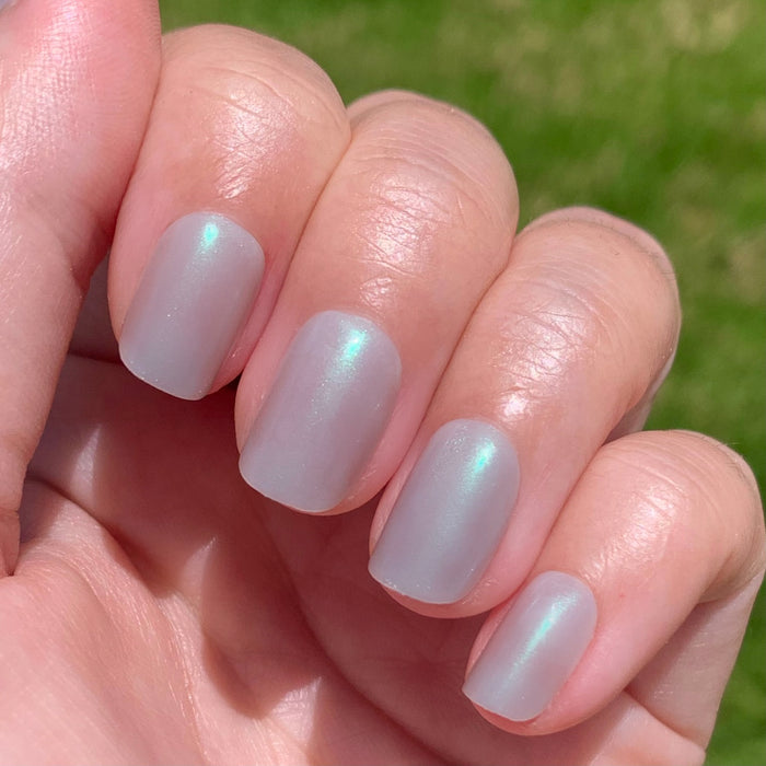That’s So Ursula | Squoval | Extra Short blue iridescent extra short squoval press-on nails for at-home mani