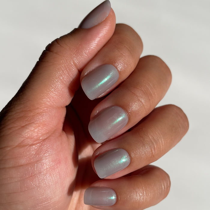 That’s So Ursula | Squoval | Extra Short blue iridescent extra short squoval press-on nails for at-home mani