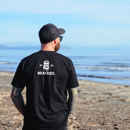 Man Modeling the Back of the BEARDED. tee