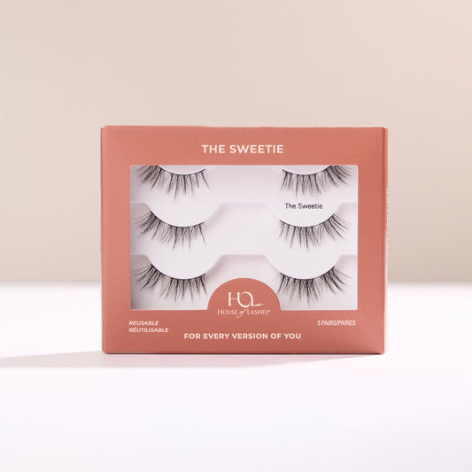 The Sweetie Half Lash box in peach tones with lashes visible through the window