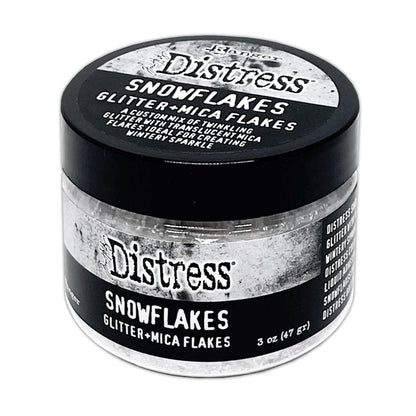 Tim Holtz - Distress Snowflakes - Glitter + Mica Flakes - 3oz. Translucent flakes for a nostalgic sparkle. At Embellish Away in Bowmanville Ontario Canada.