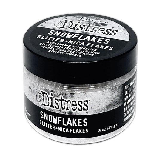 Tim Holtz - Distress Snowflakes - Glitter + Mica Flakes - 3oz. Translucent flakes for a nostalgic sparkle. At Embellish Away in Bowmanville Ontario Canada.