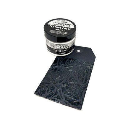 Tim Holtz - Distress Texture Paste - 3oz - Twinkle. Add texture and sparkle to Winter Holiday creations. At Embellish Away in Bowmanville Ontario Canada.
