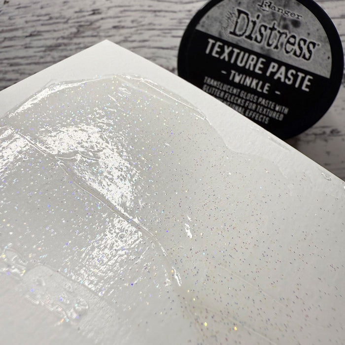 Tim Holtz - Distress Texture Paste - 3oz - Twinkle. Add texture and sparkle to Winter Holiday creations. At Embellish Away in Bowmanville Ontario Canada.
