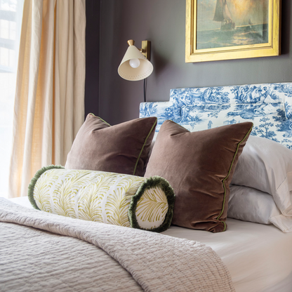Emma Chartreuse throw pillow styled on a bed, made to order in the USA with short lead times