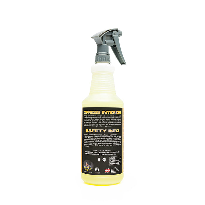The back of a spray bottle of P & S Xpress Interior on a white abckground.